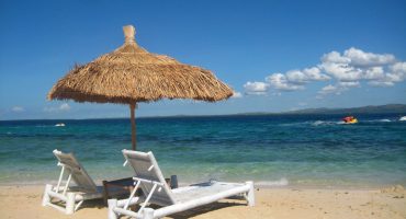 Italiani in vacanza: più soldi e meno partenze